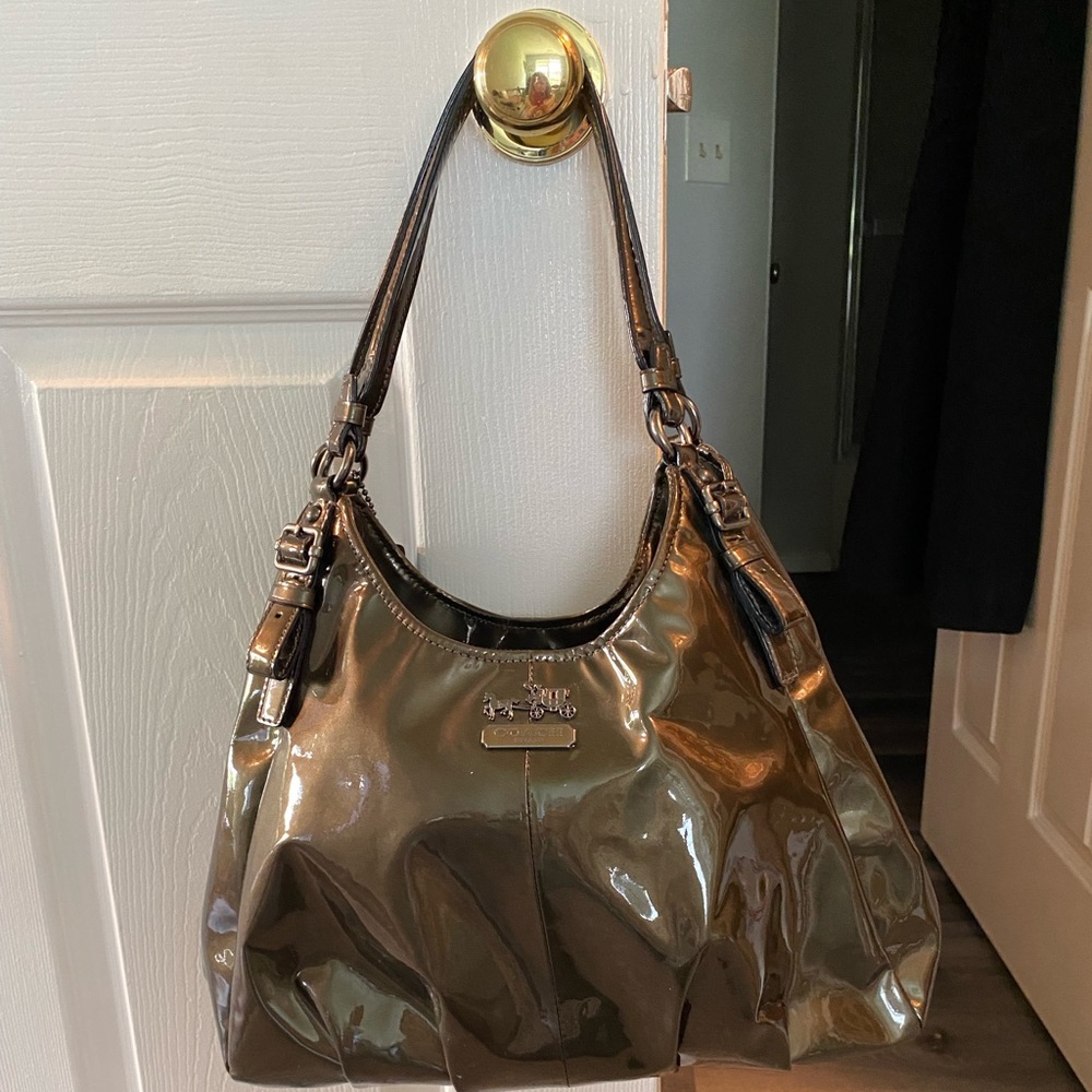 Coach handbag, like new condition, 3 compartments.